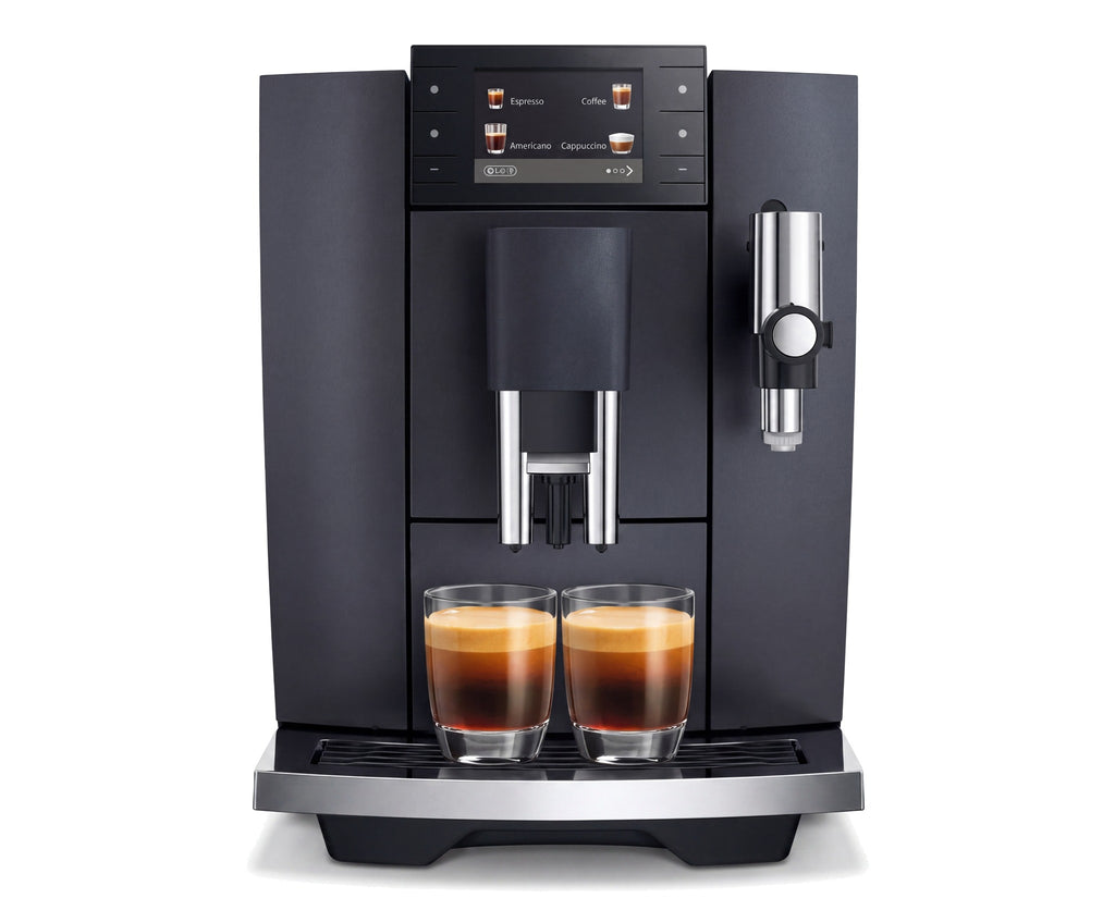 Cafetera superautomática negra vista de frente con dos espressos servidos